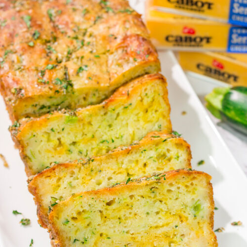This Cheesy Zucchini Bread is packed with summer flavor! Toast up a slice of this savory quick bread and serve it next to salad or soup for an easy meal.
