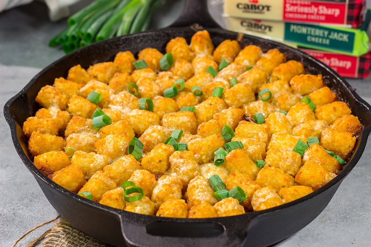 This Bacon Cheeseburger Casserole features all of the flavors of a classic burger + fries...just in casserole form! Grab a skillet and bake this for dinner tonight.