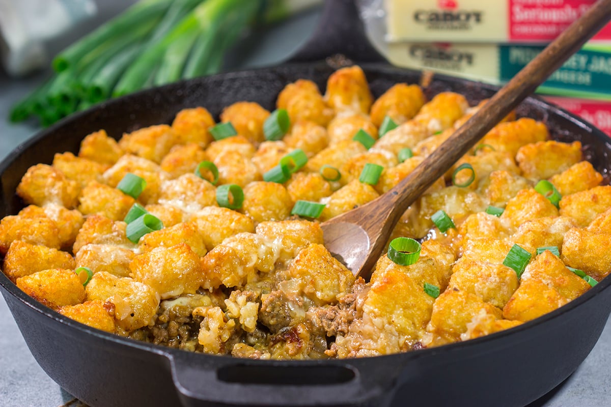 This Bacon Cheeseburger Casserole features all of the flavors of a classic burger + fries...just in casserole form! Grab a skillet and bake this for dinner tonight.