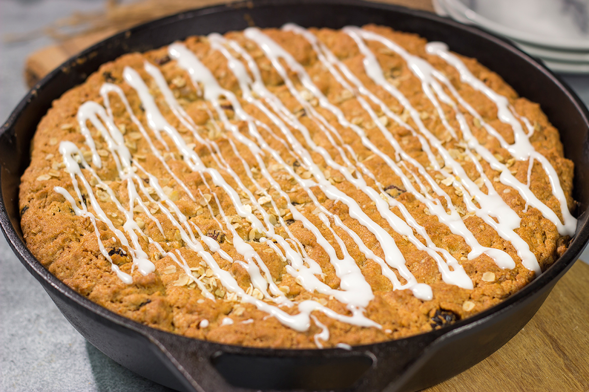 These delicious Oatmeal Raisin Bars taste just like the classic cookie...but they're easier to make. Grab a skillet and bake these bars for dessert tonight!