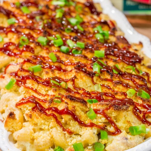 This BBQ Mac & Cheese recipe combines multiple favorites into one! Creamy mac and cheese, tender pulled pork and crumbled cornbread all combine to create a delicious dish.