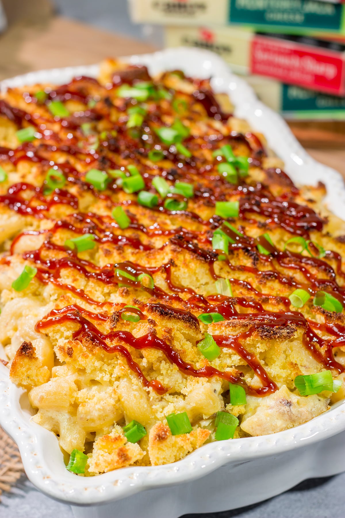 This BBQ Mac & Cheese recipe combines multiple favorites into one! Creamy mac and cheese, tender pulled pork and crumbled cornbread all combine to create a delicious dish.