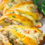 This Cheesy Sausage Wreath features creamy sausage gravy wrapped in golden brown dough. It makes for an excellent holiday breakfast or brunch when guests are in town!